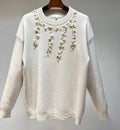 MC654 Elegant Cream Sweater with Pearl Embellishments