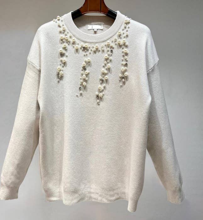 MC654 Elegant Cream Sweater with Pearl Embellishments